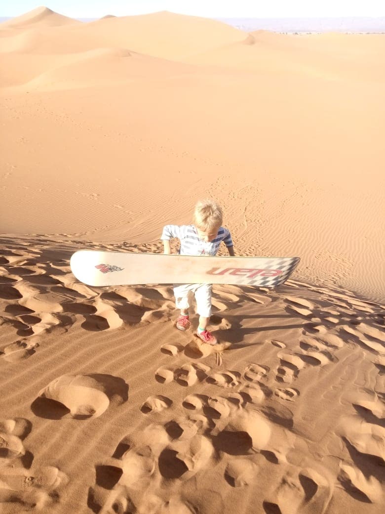 Moon resting on woven tents